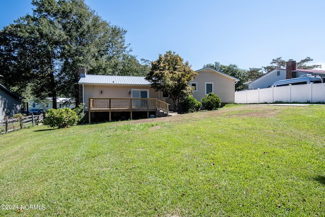 view of yard featuring a wooden deck