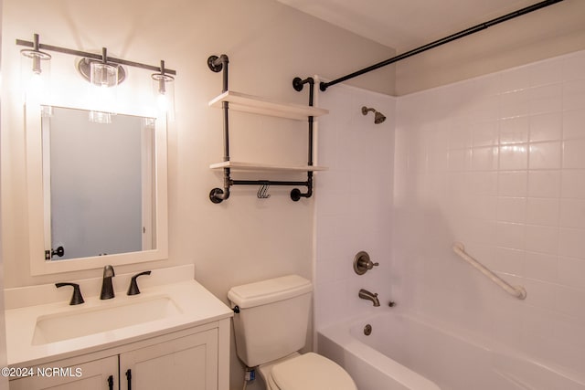 full bathroom with vanity, toilet, and tiled shower / bath combo