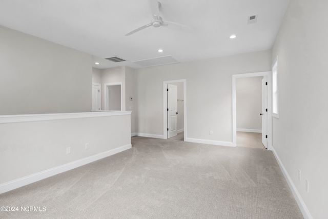 carpeted empty room with ceiling fan