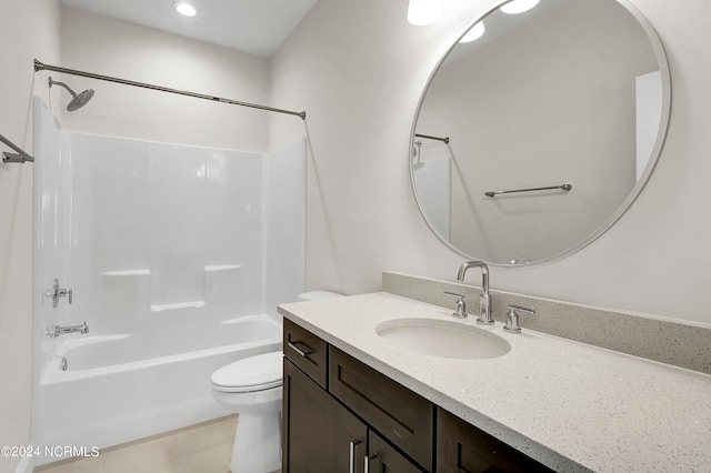 full bathroom with vanity, toilet, and  shower combination