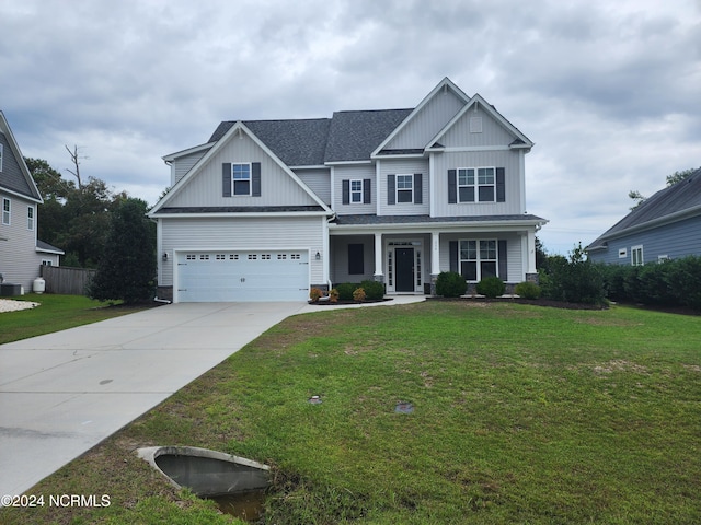 view of front of home featuring central air condition unit, a front yard, a porch, and a garage