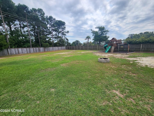 view of yard with a playground