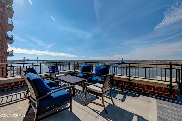 view of patio featuring a water view