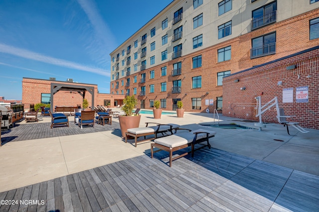 view of property's community featuring a pool