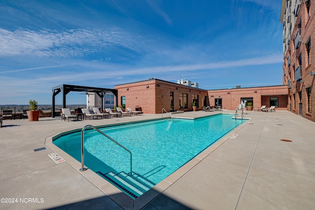 view of pool with a patio area