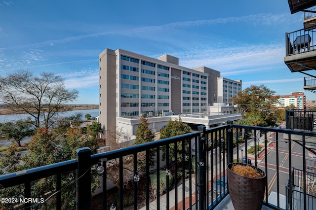 balcony featuring a water view