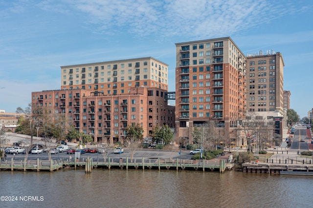 view of building exterior featuring a water view