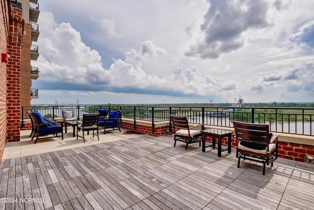 wooden deck with outdoor lounge area