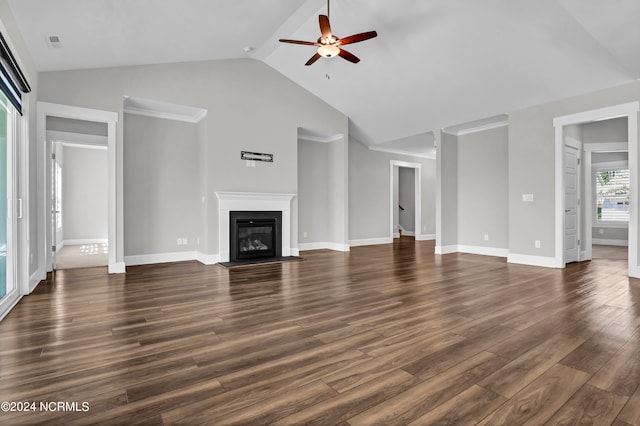 unfurnished living room with high vaulted ceiling, ceiling fan, and dark hardwood / wood-style flooring