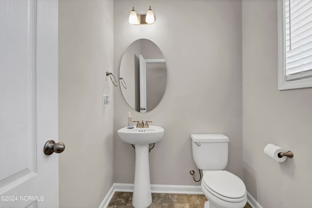 bathroom featuring toilet