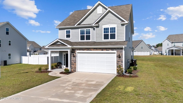 view of front facade featuring a garage and a front yard