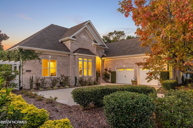 view of front of home with a garage