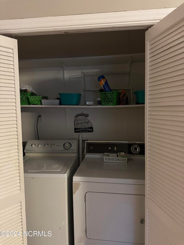 laundry area featuring washer and clothes dryer