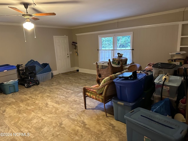 misc room featuring ceiling fan and crown molding