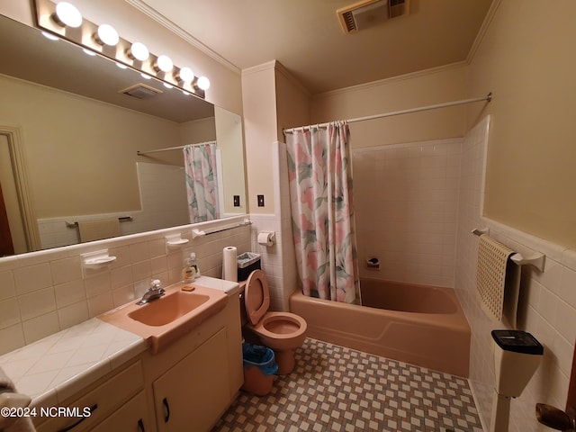 full bathroom featuring shower / bath combination with curtain, crown molding, and tile walls