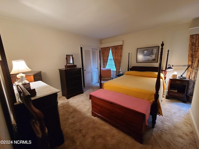 bedroom with carpet flooring and a closet