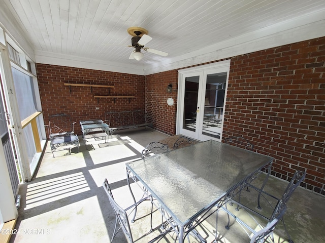 view of patio with ceiling fan and french doors