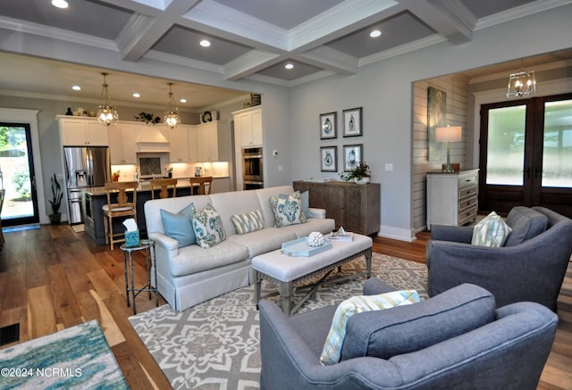 living room with beam ceiling, wood-type flooring, and coffered ceiling