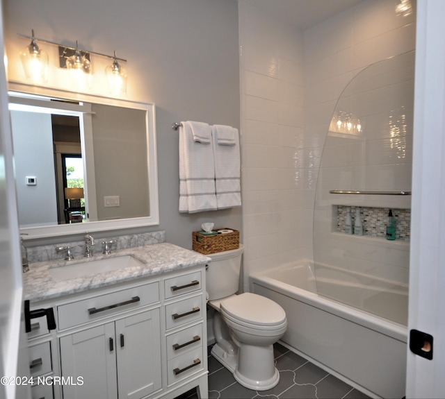 full bathroom with tile patterned floors, toilet, vanity, and tub / shower combination