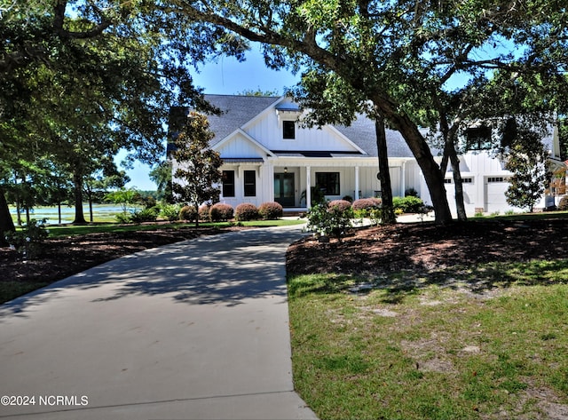 modern farmhouse style home with a garage