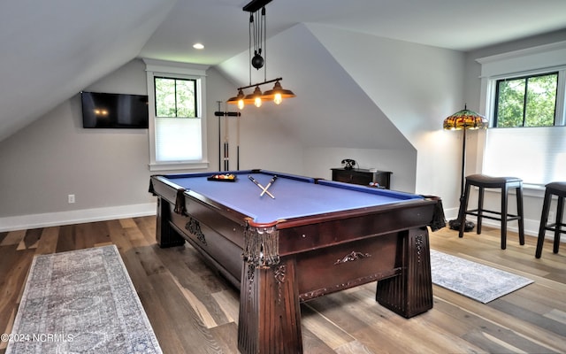 rec room with hardwood / wood-style floors, plenty of natural light, billiards, and vaulted ceiling