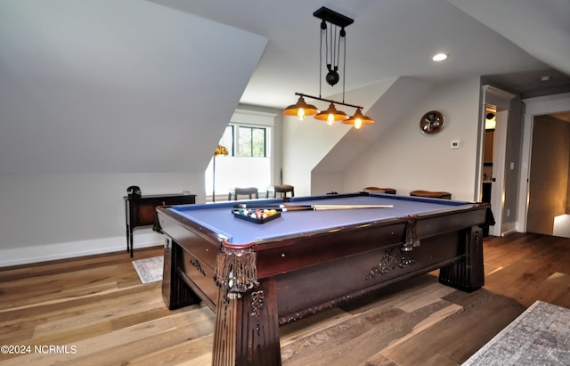 recreation room with light wood-type flooring, vaulted ceiling, and pool table