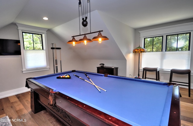 recreation room with hardwood / wood-style flooring, a healthy amount of sunlight, vaulted ceiling, and pool table