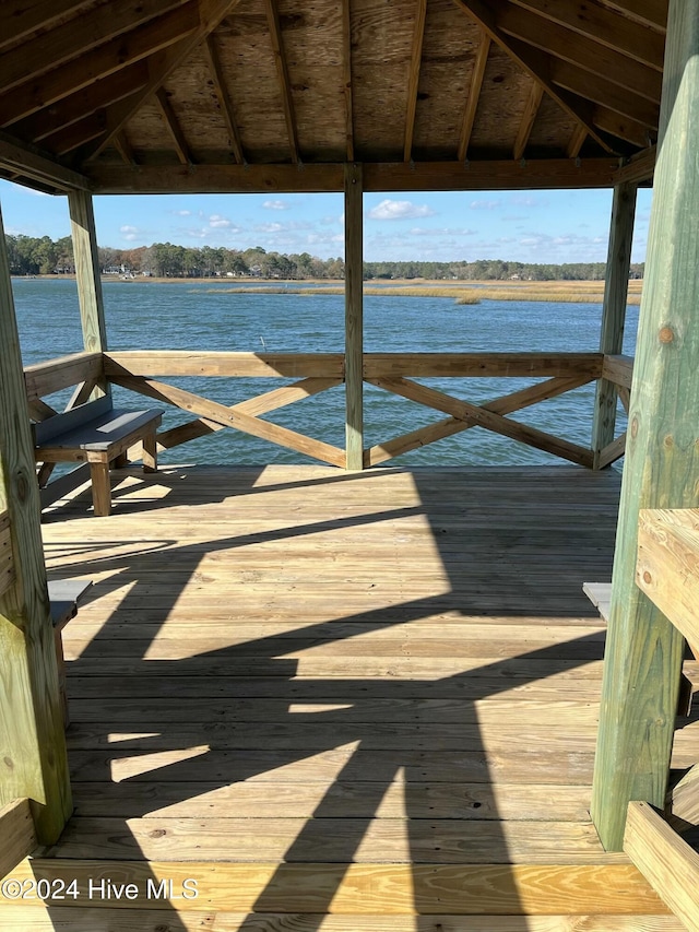 dock area with a water view