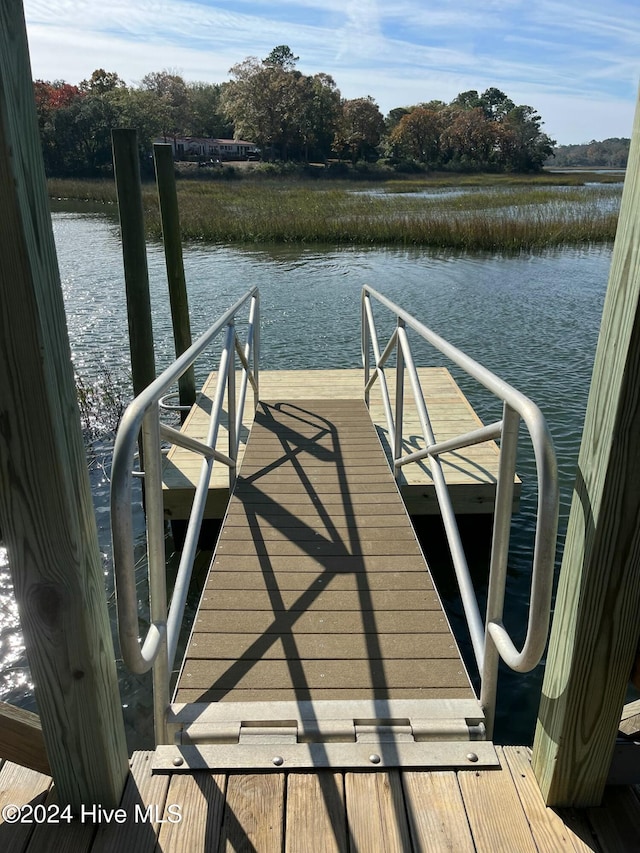 view of dock with a water view