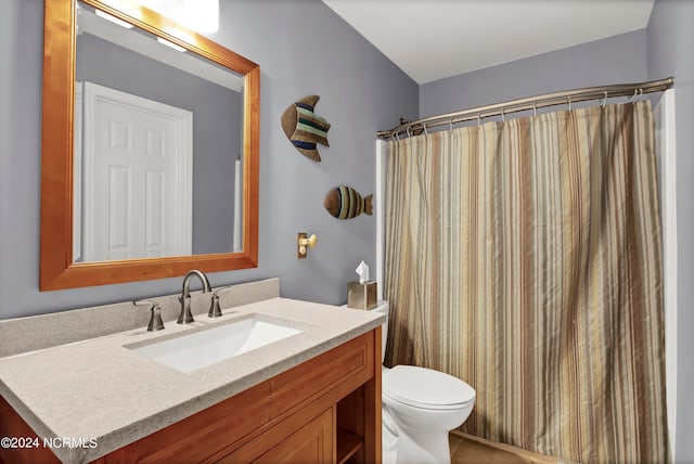 full bathroom with toilet, a shower with curtain, tile patterned flooring, and vanity