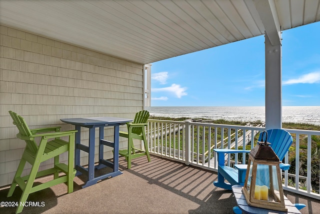 balcony with a view of the beach