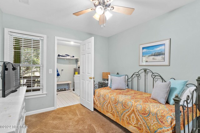 bedroom with ceiling fan and carpet