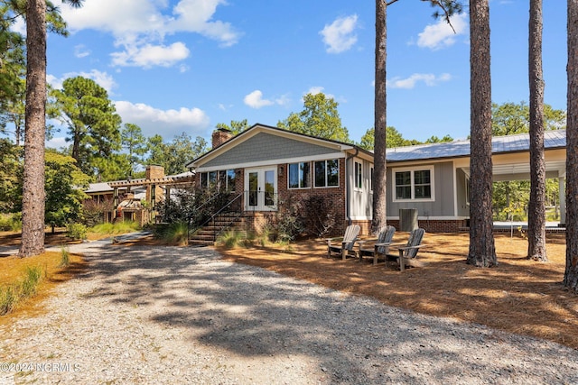 view of front of house with french doors