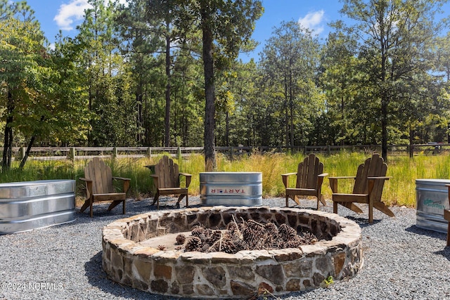 view of patio featuring an outdoor fire pit