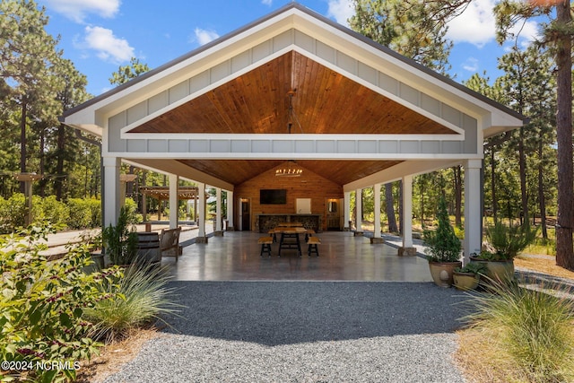 view of home's community with a patio area