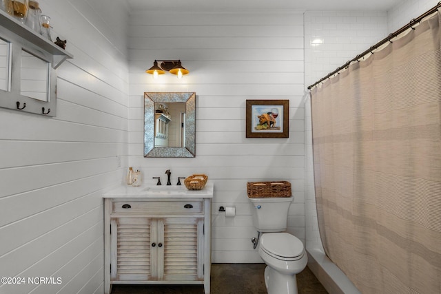 bathroom featuring vanity, wood walls, toilet, and a shower with shower curtain