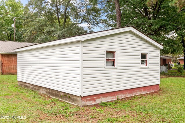 exterior space with a yard