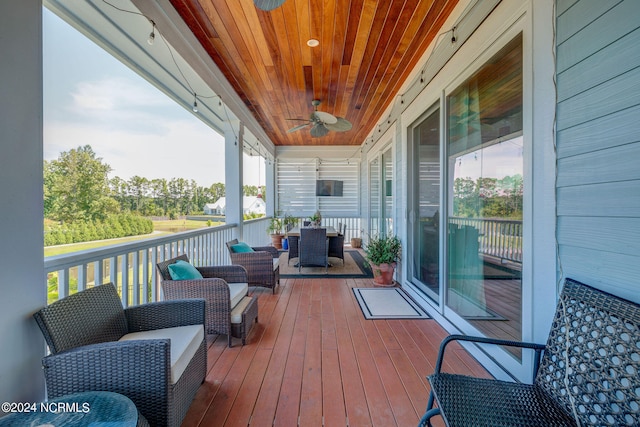 wooden deck featuring an outdoor hangout area