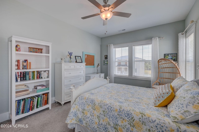 carpeted bedroom with ceiling fan