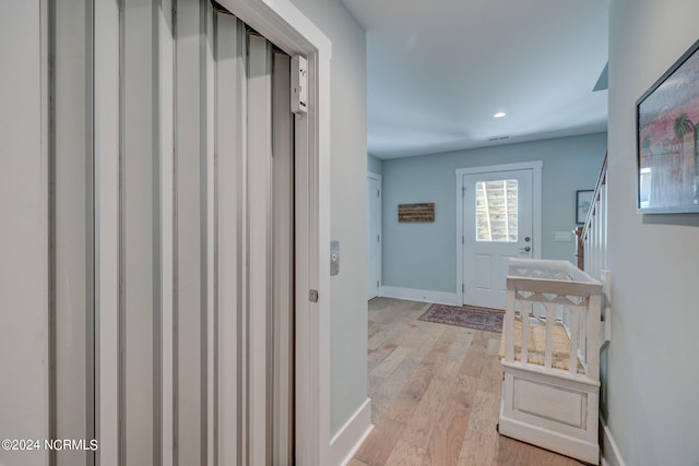 hall featuring light wood-type flooring