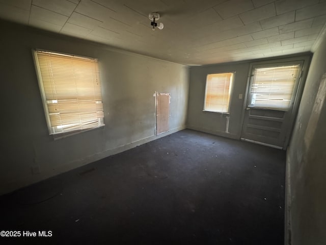 empty room featuring concrete floors