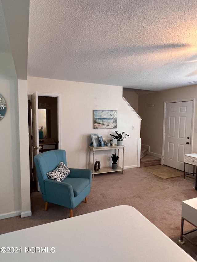 interior space featuring a textured ceiling