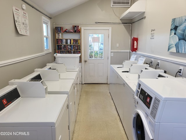 laundry room featuring washing machine and dryer