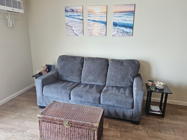 living room with a wall mounted air conditioner