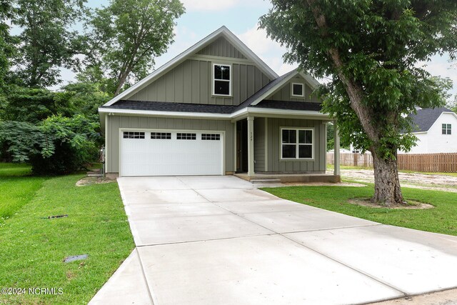 view of front of home with a front lawn