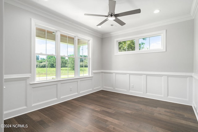 spare room featuring ceiling fan, dark hardwood / wood-style floors, and ornamental molding