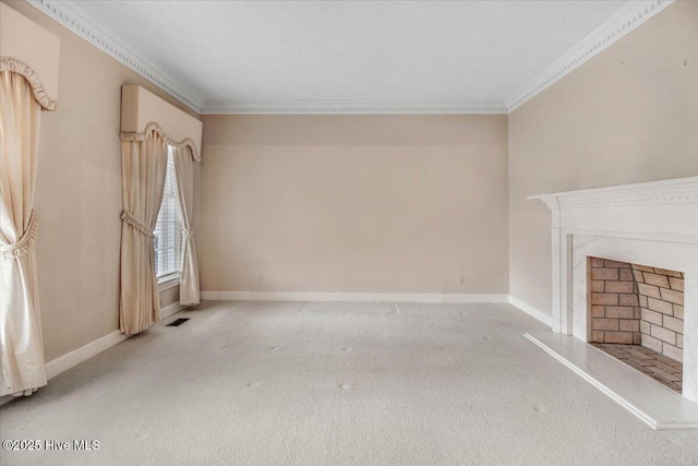 unfurnished living room featuring ornamental molding and carpet floors