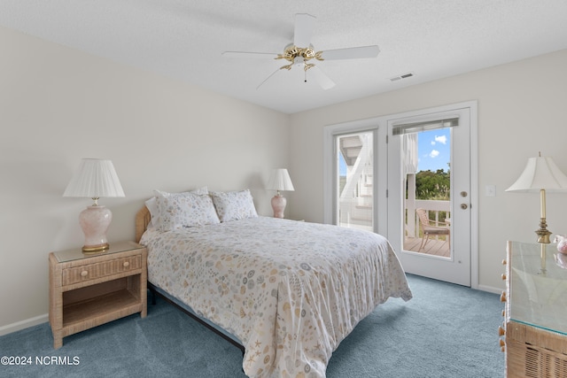 bedroom with a textured ceiling, access to exterior, ceiling fan, and carpet floors