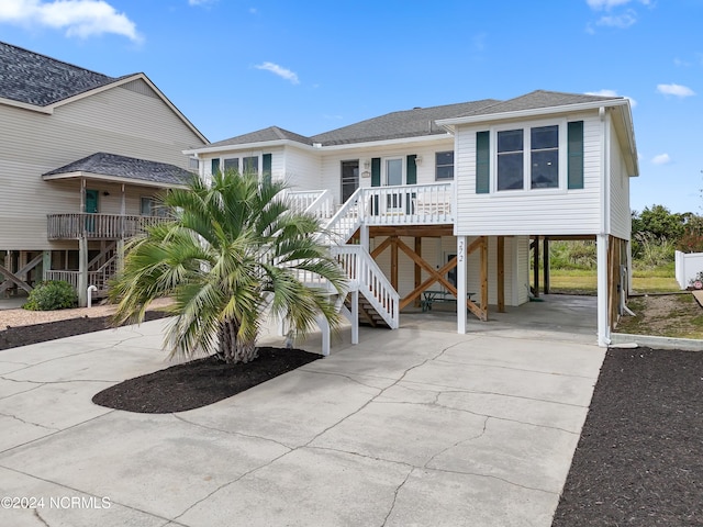 coastal inspired home with a carport