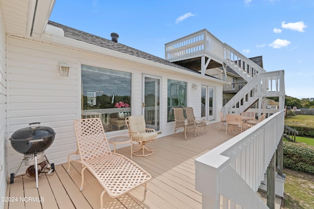 wooden deck with area for grilling